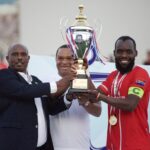 Red Arrows captain Yusuf Saddam receives the trophy from CECAFA President Wallace Karia at the KMC stadium in Tanzania. (Photo via X/@Tanfootball)