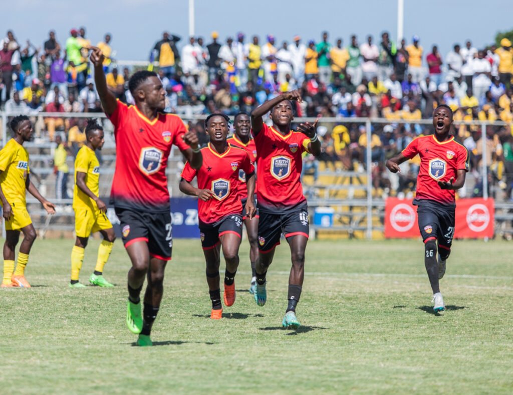 FC MUZA captain Kelvin Mwanza leads his team in celebrating his goals against Kabwe Warirors in a 1-2 defeat in the Absa Cup 2024 semi-final match played at Arthur Davies stadium in Kitwe. (Photo via FAZ media)