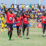 FC MUZA captain Kelvin Mwanza leads his team in celebrating his goals against Kabwe Warirors in a 1-2 defeat in the Absa Cup 2024 semi-final match played at Arthur Davies stadium in Kitwe. (Photo via FAZ media)