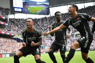 LONDON, ENGLAND - SEPTEMBER 15: Gabriel of Arsenal celebrates scoring his team's first goal during the Premier League match between Tottenham Hotspur FC and Arsenal FC at Tottenham Hotspur Stadium on September 15, 2024 in London, England. (Photo by David Price/Arsenal FC via Getty Images)