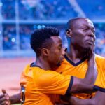 An emotionally charged Kampamba being consoled by his captain Lubambo Musonda after scoring in Zambia's 3-2 win over Sierra Leone in the 2025 AfCON qualifiers on September 9, 2024, at the Levy Mwanawansa stadium in Ndola. (Photo via FAZ media)