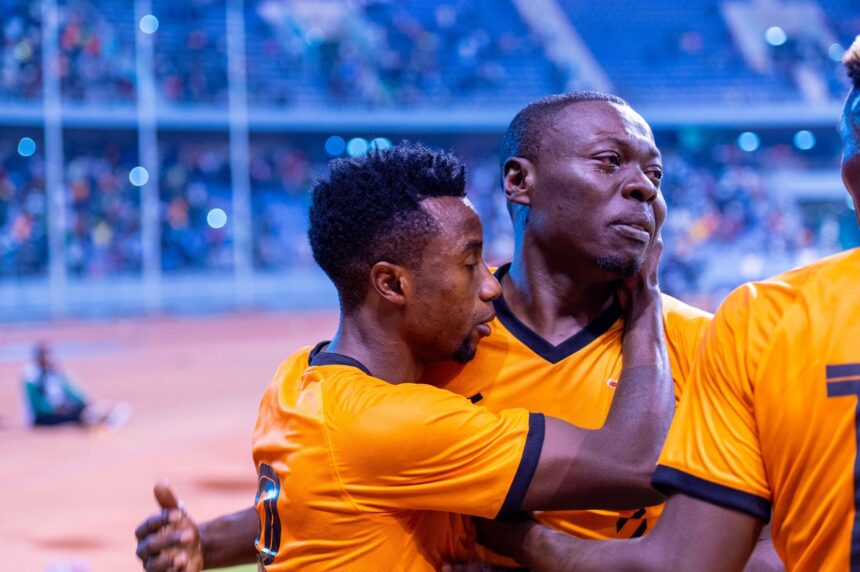 An emotionally charged Kampamba being consoled by his captain Lubambo Musonda after scoring in Zambia's 3-2 win over Sierra Leone in the 2025 AfCON qualifiers on September 9, 2024, at the Levy Mwanawansa stadium in Ndola. (Photo via FAZ media)