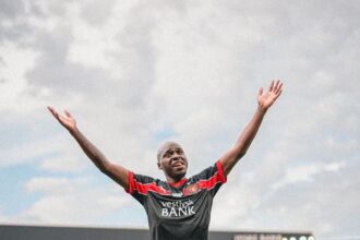 Edward Chilufya celebrates with fans after scoring on his birthday. (Photo via @chilufyaedward10