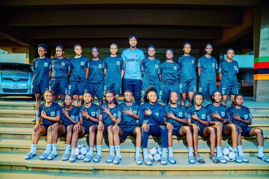 Oga Kent with his Student Girls FC players. (Photo via STG media)