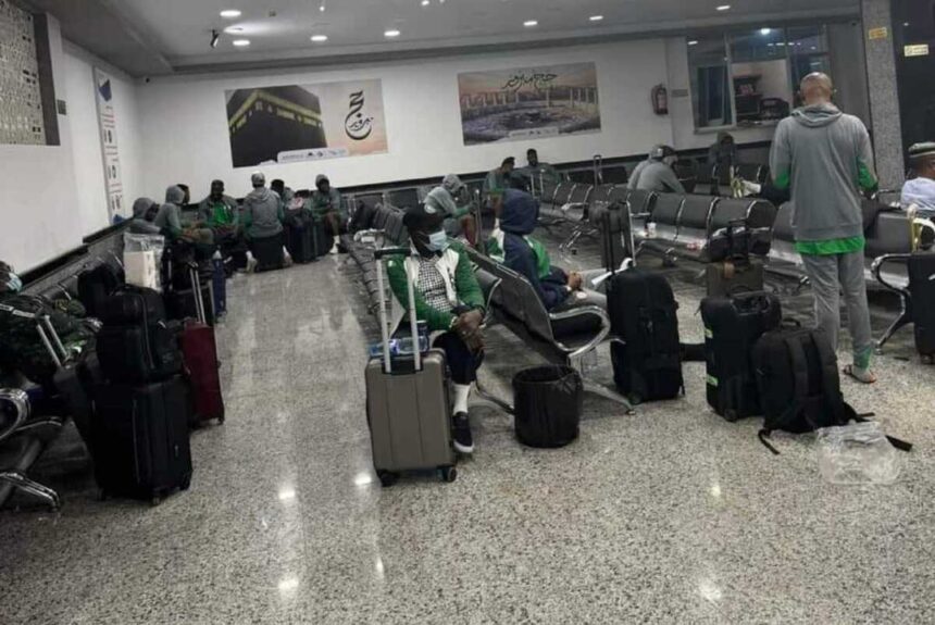 Nigerian players and officials at the Al Abaq Airport in Bayda City. (Photo/courtesy)