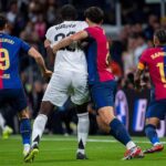 Pau Cubarsi of FC Barcelona (R) fights for the position against Antonio Rudiger of Real Madrid CF (L) during the La Liga EA Sports 2024/25 football match between Real Madrid CF vs FC Barcelona at Estadio Santiago Bernabeu on October 26, 2024 in Madrid, Spain. (Photo by Alberto Gardin/ZUMA Press Wire)