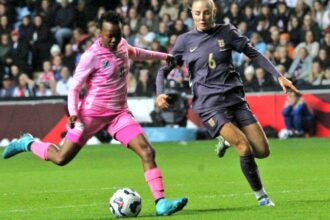 Thembi Kgatlana and England's Alex Greenwood in action during a friendly match on October 29, 2024. (Photo via X/ @Banyana_Banyana)