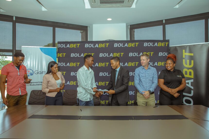 From left to right: Chisenga Mwape, Mumba Mwape, and GameAid founder Muuluka Nalubamba, Ray Kumwenda (BolaBet CFO), Eamon Park (BolaBet Country Manager), and Chama Chikonde (BolaBet Marketing Manager).