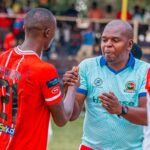 Godfrey Ngwenya and Chisi Mbewe shaking hands. (Photo via Red Arrows FC media)