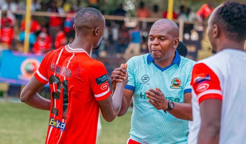 Godfrey Ngwenya and Chisi Mbewe shaking hands. (Photo via Red Arrows FC media)