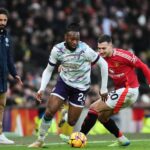 Manchester, UK. 22nd Dec, 2024. Antoine Semenyo of Bournemouth gets the better of Diogo Dalot of Manchester United during the Premier League match Manchester United vs Bournemouth at Old Trafford, Manchester, United Kingdom, 22nd December 2024 (Photo by Craig Thomas/News Images) in Manchester, United Kingdom on 12/22/2024. (Photo by Craig Thomas/News Images/Sipa USA via Alamy Live News)