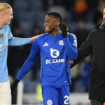 Erling Haaland of Manchester City laughs with Patson Daka of Leicester as Ruud van Nistelrooy, Manager of Leicester City, looks on at the end of the Premier League match between Leicester City FC and Manchester City FC at The King Power Stadium on December 29, 2024 in Leicester, England. (Photo by Michael Regan/Getty Images)