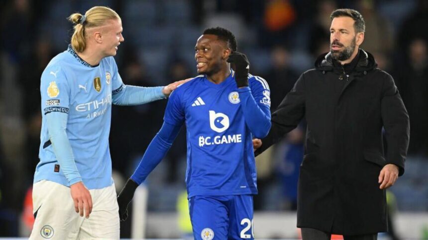 Erling Haaland of Manchester City laughs with Patson Daka of Leicester as Ruud van Nistelrooy, Manager of Leicester City, looks on at the end of the Premier League match between Leicester City FC and Manchester City FC at The King Power Stadium on December 29, 2024 in Leicester, England. (Photo by Michael Regan/Getty Images)