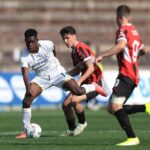 Milan, Italy. 9th Apr, 2025. Filippo Scotti of AC Milan looks on as team mate Emanuele Sala challenges Joseph Liteta of Cagliari Calcio during the Coppa Italia match at Arena Civica Gianni Brera, Milan. Picture credit should read: Jonathan Moscrop/Sportimage (Photo via Sportimage Ltd/Alamy Live News)