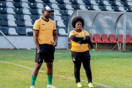 Assistant coach Cosmas Kabaza keeping tabs on proceedings alongside head coach Carol Kanyemba. (Photo via FAZ media)