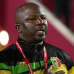 DOHA, QATAR - NOVEMBER 11: Adama Diallo, Head Coach of Mali, looks on prior to the first stage Group L match between Saudi Arabia and Mali at Aspire Zone Pitch 7 on November 11, 2025 in Doha, Qatar. (Photo by Jurij Kodrun - FIFA/FIFA via Getty Images)