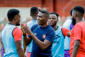 Elijah Tana with Nkana players during training. (Photo via Nkana FC media)