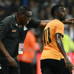 Zambia's head coach Moses Sichone gives instructions to forward Fashion Sakala during a friendly football match between Argentina and Zambia at La Bombonera stadium in Buenos Aires on March 31, 2026. (Photo by Luis ROBAYO / AFP via Getty Images)