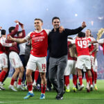 LONDON, ENGLAND - MAY 05: Mikel Arteta manager / head coach of Arsenal celebrates with Leandro Trossard after the UEFA Champions League 2025/26 Semi Final Second Leg match between Arsenal FC and Atletico de Madrid at Arsenal Stadium on May 05, 2026 in London, England. (Photo by Catherine Ivill - AMA/Getty Images)
