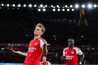LONDON, ENGLAND - AUGUST 21: Martin Odegaard of Arsenal celebrates after scoring their side's third goal during the Premier League 2026/27 match between Arsenal FC and Coventry City at Emirates Stadium on August 21, 2026 in London, England. (Photo by James Gill - Danehouse/Getty Images)