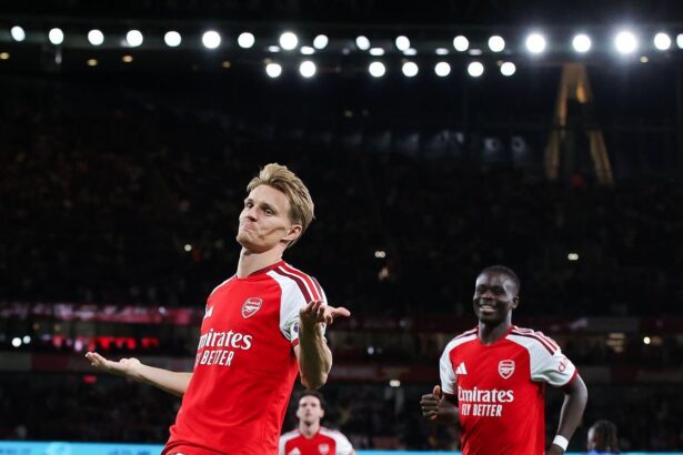 LONDON, ENGLAND - AUGUST 21: Martin Odegaard of Arsenal celebrates after scoring their side's third goal during the Premier League 2026/27 match between Arsenal FC and Coventry City at Emirates Stadium on August 21, 2026 in London, England. (Photo by James Gill - Danehouse/Getty Images)