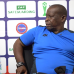 Botswana U-20 head coach BOYO OSCAR RADIPOTSANE during a post-match press briefing.